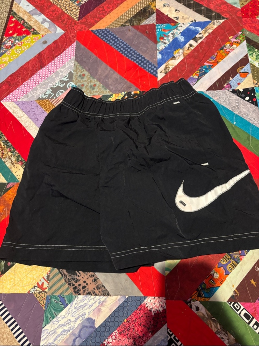 Nike Black Shorts with White Swoosh Logo